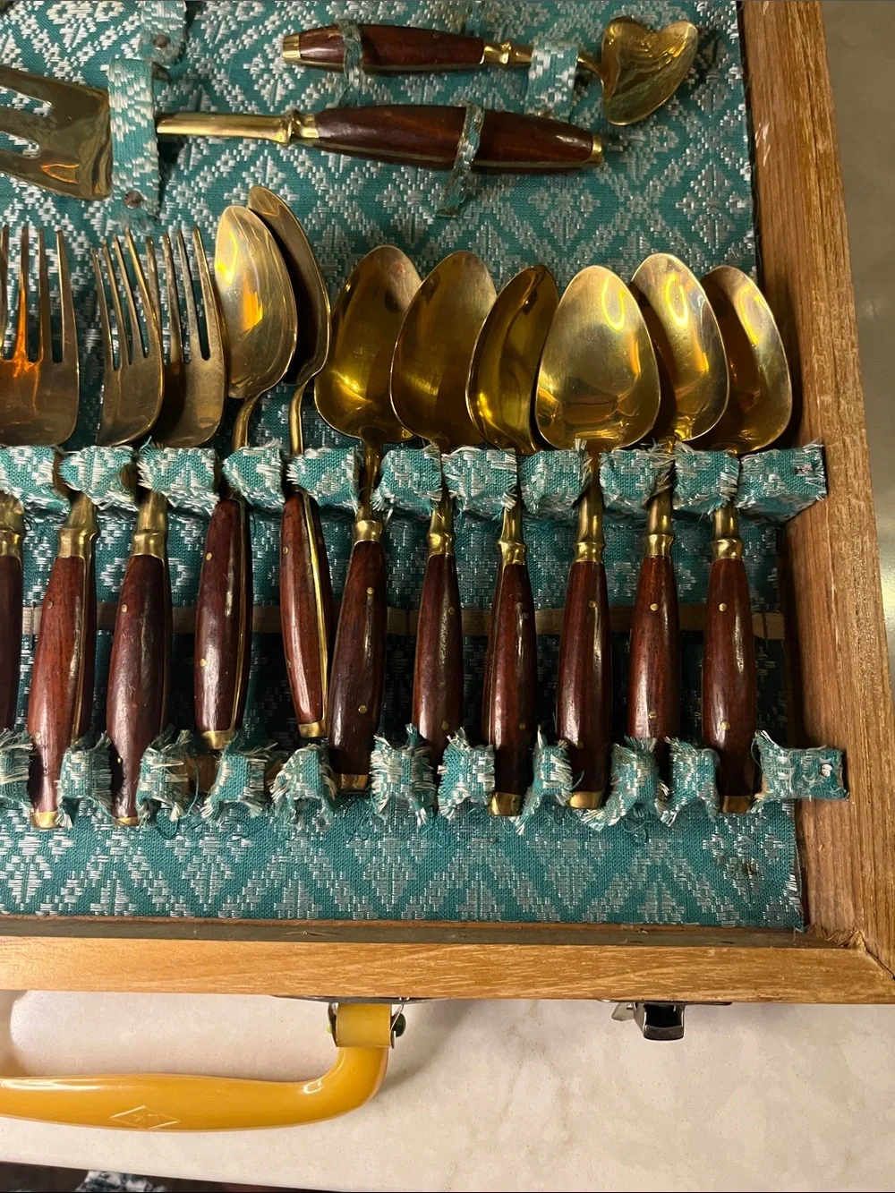 Vintage brass flatware 29 pieces rosewood handles.  Wood  handled chest Bangkok